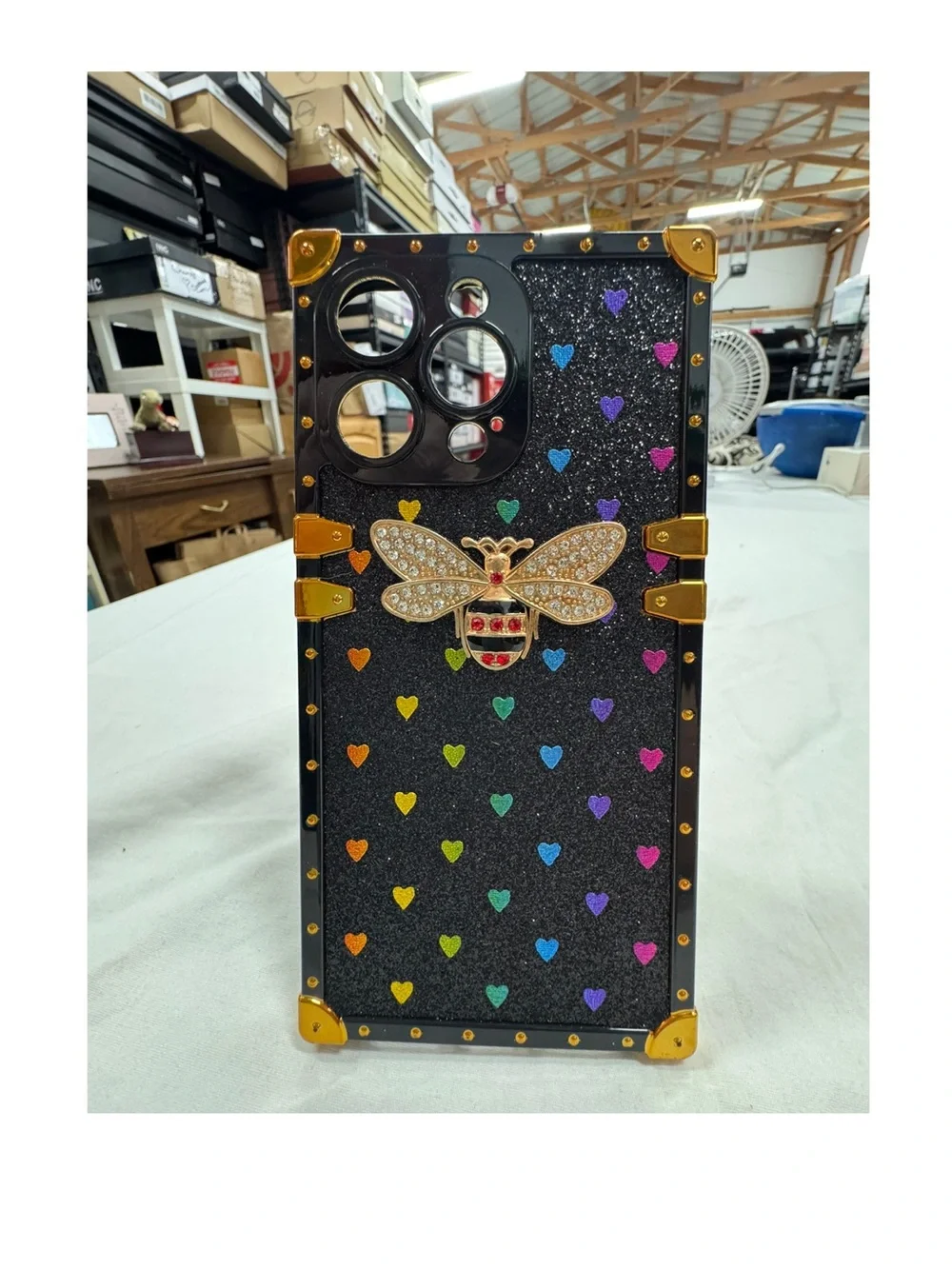 15 Pro Max Phone Case with Rainbow Hearts and Bee.